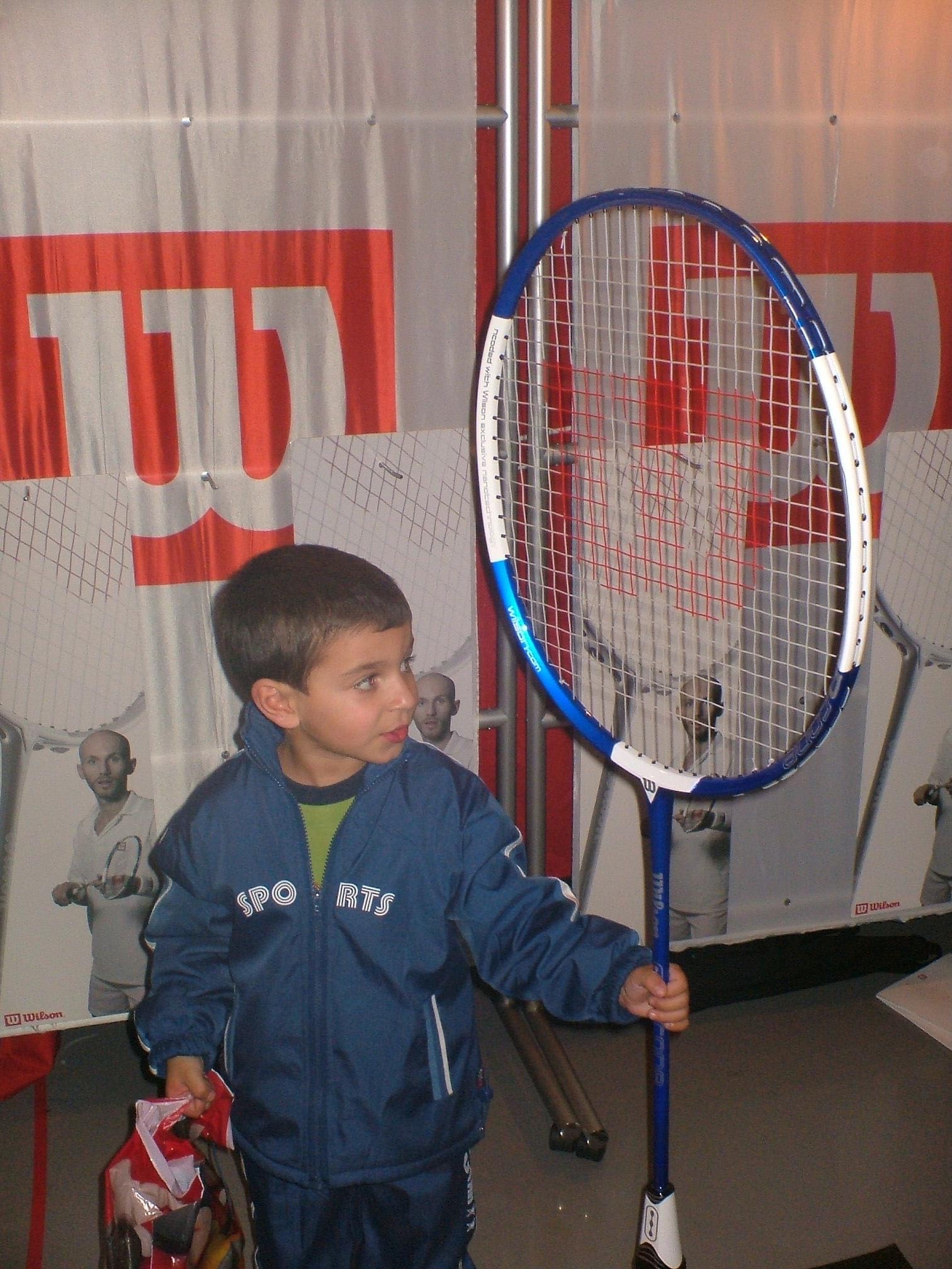 Young Sam with Racket
